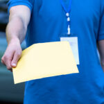 Process server serving document package, demonstrating what kind of papers do process servers serve