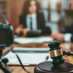 A legal deposition being recorded on video.