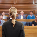 Lawyer pleading case to jury in court to demonstrate what is a jury consultant
