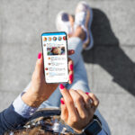 Woman using social media app on her phone